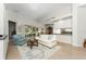 Spacious living room with comfortable seating and sliding doors leading to the outside area at 12185 Obelia Ln, Orlando, FL 32827
