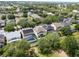 This aerial displays community with manicured lawns, mature trees and serene ponds at 13156 Hatherton Cir, Orlando, FL 32832
