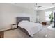 Bedroom with neutral walls, ceiling fan, and plenty of natural light at 13156 Hatherton Cir, Orlando, FL 32832