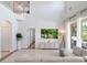 Bright living room features large windows, high ceilings, tile flooring, and a comfortable sectional sofa at 13156 Hatherton Cir, Orlando, FL 32832