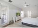 Primary bedroom features patio access, a walk-in closet, and neutral walls at 13156 Hatherton Cir, Orlando, FL 32832