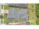 Top-down aerial shot showcasing a home's roof, yard, and surrounding neighborhood layout at 14078 Alafaya Oak Bnd, Orlando, FL 32828