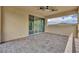 Spacious covered balcony with brick pavers and a ceiling fan, perfect for outdoor relaxation at 14078 Alafaya Oak Bnd, Orlando, FL 32828