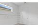 Walk-in closet features custom shelving and ample storage space at 14078 Alafaya Oak Bnd, Orlando, FL 32828