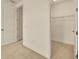 Walk-in closet with wire shelving and carpet, offering ample storage space at 14078 Alafaya Oak Bnd, Orlando, FL 32828