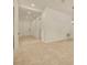 Clean and bright entryway featuring neutral tile flooring, creating a welcoming entrance to the home at 14078 Alafaya Oak Bnd, Orlando, FL 32828