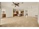 Spacious living area flows seamlessly to the modern kitchen, offering an open and airy atmosphere at 14078 Alafaya Oak Bnd, Orlando, FL 32828
