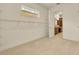 Walk-in closet with carpet flooring, wire shelving and view of bathroom at 14078 Alafaya Oak Bnd, Orlando, FL 32828