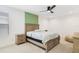 Comfortable bedroom featuring a ceiling fan and neutral walls at 14655 Erice Ave, Clermont, FL 34714