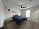 Cozy bedroom featuring a fan and carpet at 14936 Masthead Landing Cir, Winter Garden, FL 34787