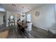 Dining room featuring wood-look floors, chandelier, and ample seating for a Gathering at 14936 Masthead Landing Cir, Winter Garden, FL 34787
