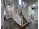 Grand foyer with soaring ceilings, a staircase, and natural light at 14936 Masthead Landing Cir, Winter Garden, FL 34787