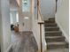 Inviting foyer with a staircase, wood-look floors, and a high ceiling at 14936 Masthead Landing Cir, Winter Garden, FL 34787