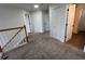 Upstairs hallway with carpet and white doors at 14936 Masthead Landing Cir, Winter Garden, FL 34787
