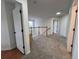 Upstairs carpeted hallway with stairwell at 14936 Masthead Landing Cir, Winter Garden, FL 34787
