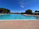 Large swimming pool and deck with lounge chairs perfect for community members at 14936 Masthead Landing Cir, Winter Garden, FL 34787