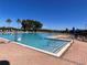 The large swimming pool is surrounded by lounge chairs offering a relaxing and fun experience at 14936 Masthead Landing Cir, Winter Garden, FL 34787
