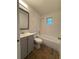 Cozy bathroom with white tile, tub-shower, vanity, and a classic design at 1523 S Mellonville Ave, Sanford, FL 32771