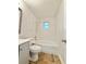 Clean bathroom features a shower-tub, toilet, and a sleek gray vanity at 1523 S Mellonville Ave, Sanford, FL 32771