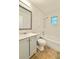 Clean bathroom with a shower and a tub at 1523 S Mellonville Ave, Sanford, FL 32771