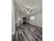 Open living room with hard wood floors and ceiling fan at 1523 S Mellonville Ave, Sanford, FL 32771