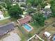 Picture of a backyard with privacy fence, a rectangular pool and green grass at 1830 W Clinton Dr, St Cloud, FL 34769