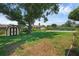 Spacious backyard with a shed and an in-ground pool at 1830 W Clinton Dr, St Cloud, FL 34769