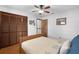 Comfortable bedroom with hardwood floors, closet and window featuring natural light at 1830 W Clinton Dr, St Cloud, FL 34769