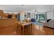 Spacious dining area with wood floors, an open layout, and views into the living and kitchen areas at 1830 W Clinton Dr, St Cloud, FL 34769