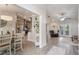 Dining room with adjacent open kitchen and living room, ideal for entertaining at 2113 Kirkland Lake Dr, Auburndale, FL 33823