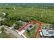 A captivating aerial view of the property showcasing the house with solar panels and expansive lot at 2135 E Old Mill Dr, Deltona, FL 32725