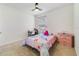 Charming bedroom with carpet, a window for light, and whimsical décor at 2135 E Old Mill Dr, Deltona, FL 32725