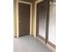 Balcony with a brown door and large sliding glass door to let natural light in at 238 Afton Sq # 106, Altamonte Springs, FL 32714