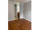 Bright bedroom featuring laminate wood flooring and neutral gray walls at 238 Afton Sq # 204, Altamonte Springs, FL 32714