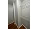 Walk-in closet features durable wood flooring and ample storage space with wire shelving at 238 Afton Sq # 204, Altamonte Springs, FL 32714