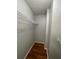 A bright walk-in closet with wood flooring and white wire shelving for storage at 238 Afton Sq # 204, Altamonte Springs, FL 32714