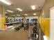 Bright community gym featuring various exercise machines and mirrored wall at 238 Afton Sq # 204, Altamonte Springs, FL 32714