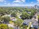 Aerial view of neighborhood showcasing mature trees, nearby amenities, and skyline at 2505 Amherst Ave, Orlando, FL 32804
