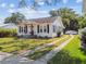 Charming home with a landscaped front yard, and long driveway at 2505 Amherst Ave, Orlando, FL 32804