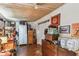 Storage room with hardwood floors, a wooden ceiling, and packed with shelves and drawers at 2505 Amherst Ave, Orlando, FL 32804