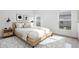 Cozy bedroom featuring a plush bed, stylish decor, and ample natural light at 2506 Aster Cove Ln, Kissimmee, FL 34758