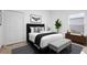 Bedroom featuring a closet, stylish decor, and ample natural light at 2506 Aster Cove Ln, Kissimmee, FL 34758