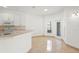 Kitchen featuring modern appliances and ample counter space, adjacent to a sunny breakfast nook at 2506 Aster Cove Ln, Kissimmee, FL 34758