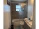Standard bathroom with a shower-tub combo, vanity, and marble countertop at 2514 Dovetail Dr, Ocoee, FL 34761