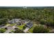 Enjoy this aerial view of charming single Gathering homes nestled in a serene suburban community at 3422 Heath Dr, Deltona, FL 32725