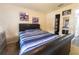 Comfortable bedroom boasts a leather-frame bed and soothing decor at 3422 Heath Dr, Deltona, FL 32725