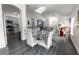 Bright dining room featuring an open concept design and modern chandelier at 3422 Heath Dr, Deltona, FL 32725