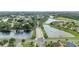 The aerial view of the community showcases the lakes, roads, and abundant greenery at 4394 Devon Ct, Kissimmee, FL 34746