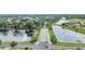 Aerial view of the neighborhood with lakes and beautiful landscaping at 4394 Devon Ct, Kissimmee, FL 34746