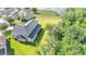 Aerial view showcasing the backyard, patio, and well-maintained landscaping of this two-story home at 4394 Devon Ct, Kissimmee, FL 34746